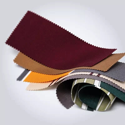Collection of fabric swatches in various colors on a light gray background