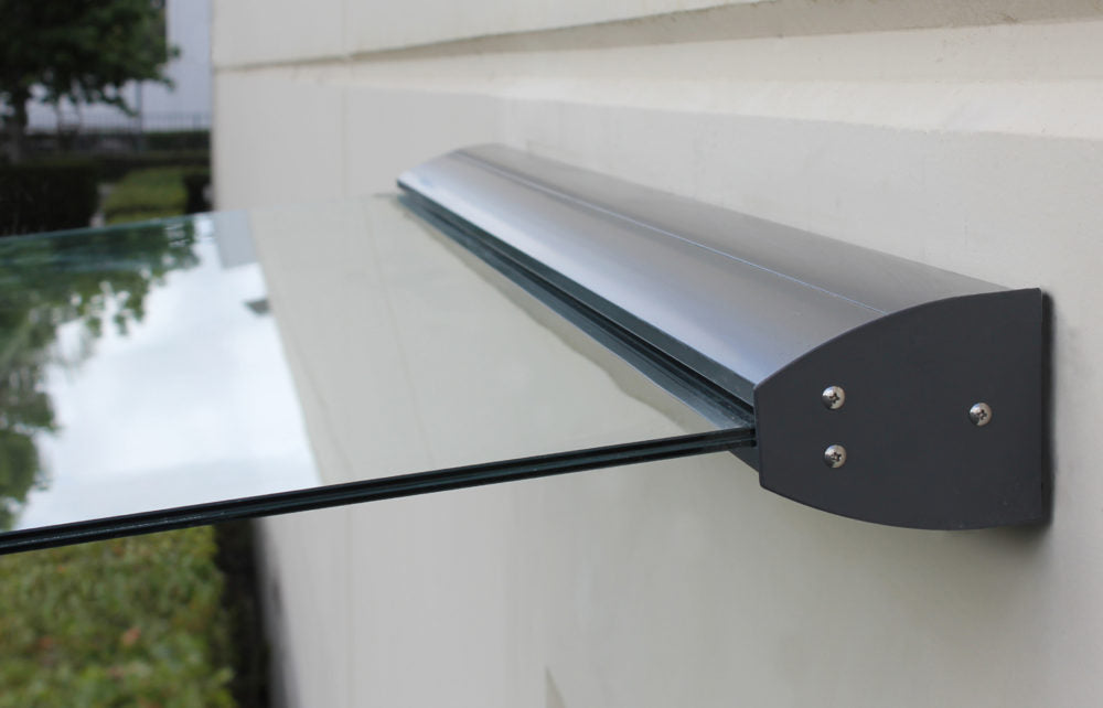 Metal awning bracket attached to a wall