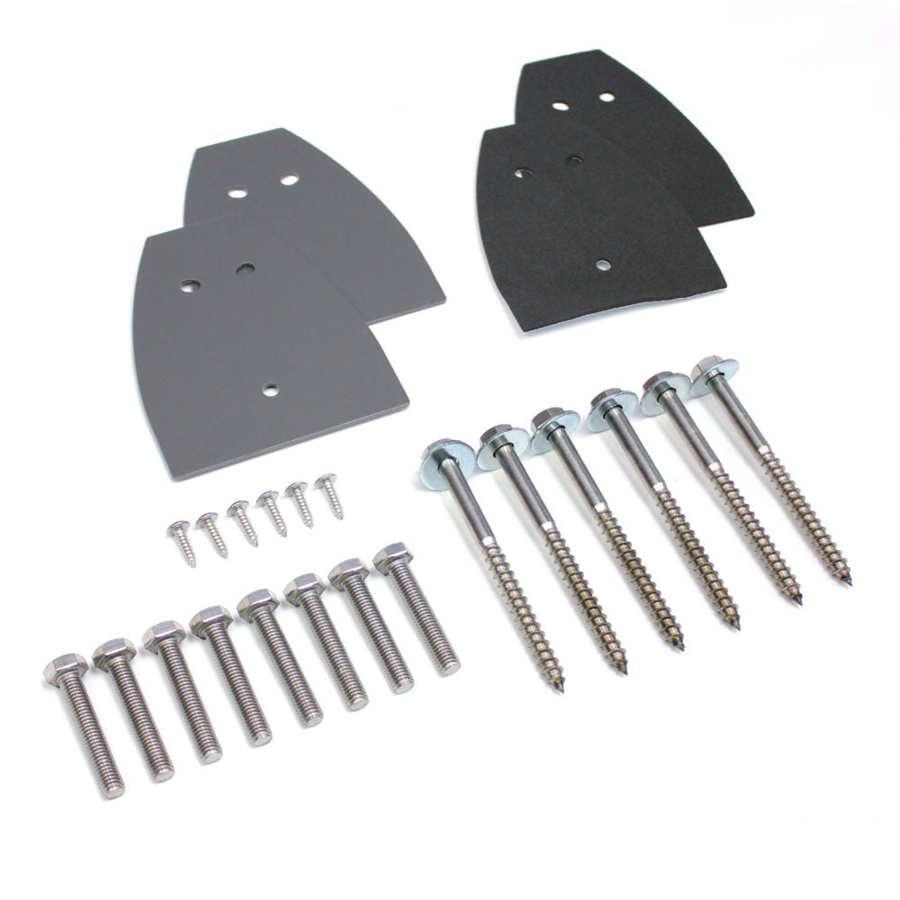 Set of metal brackets and screws on a white background