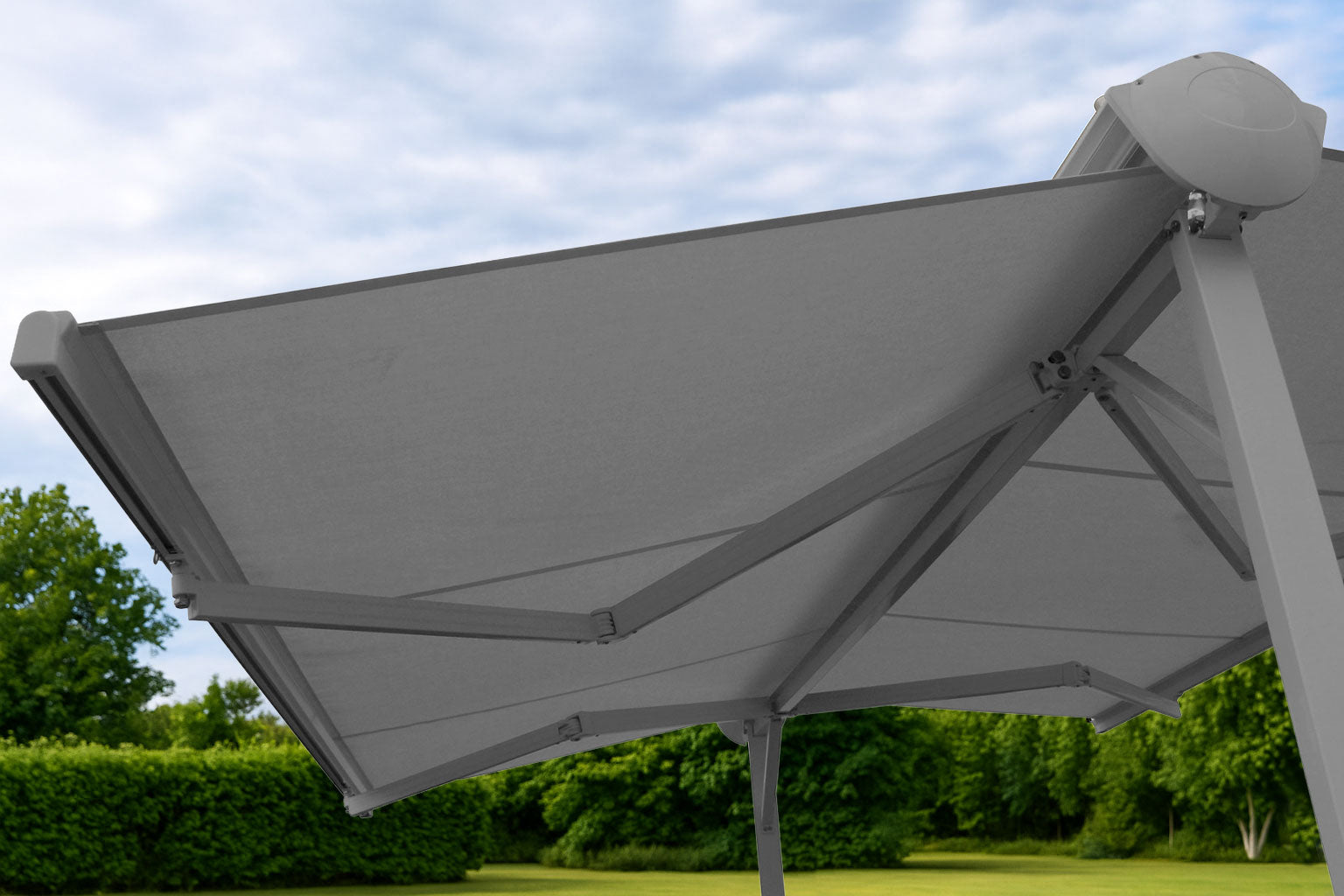 A118 Gray outdoor canopy with a blue sky and green trees in the background