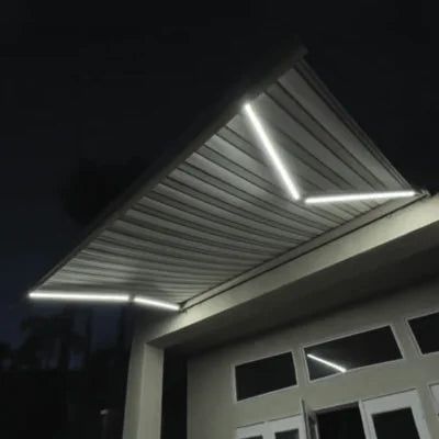 Awning with LED lights on a building at night